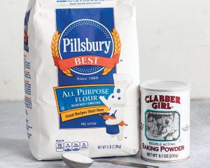 Pilsbury flour and Clabber Girl baking powder side by side