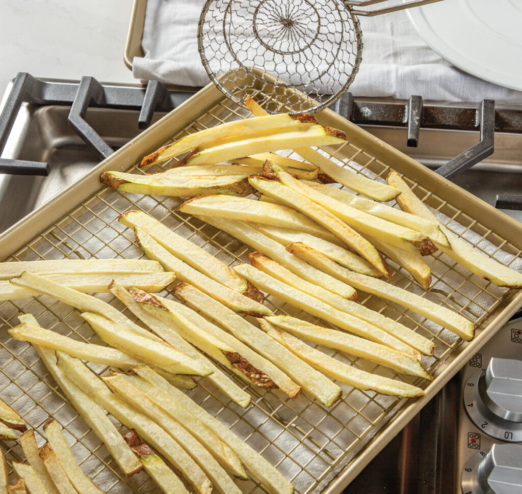 Step 5. Remove and Drain: Gently remove the potatoes with a slotted spatula and let drain on a wire rack lined with paper towels.