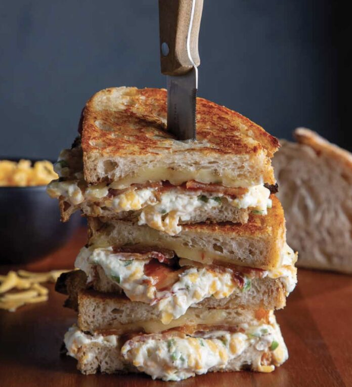 This decadent starter gets the grilled cheese upgrade in Darryl Postelnick’s Bacon Jalapeño Popper Grilled Cheese.