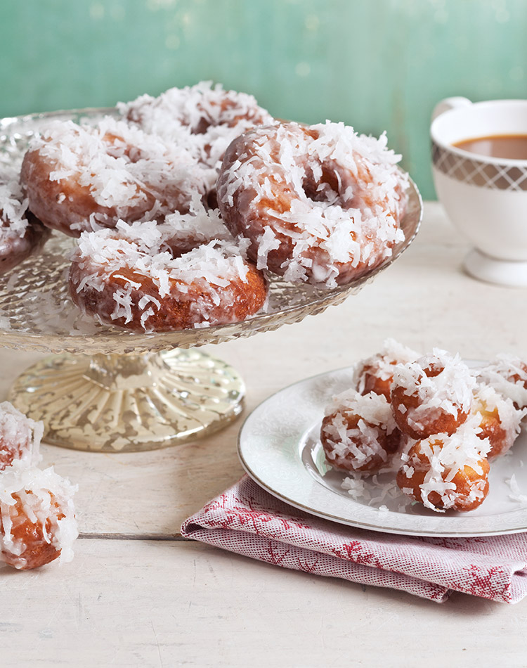 Experience the perfect balance of sweetness and tropical flavor with every bite of these decadent Coconut Cake Doughnuts. Our recipe is a tropical twist on a classic favorite, boasting a fluffy, coconut-infused cake base, coated in a creamy glaze, and sprinkled with toasted coconut flakes for an irresistible finish. 