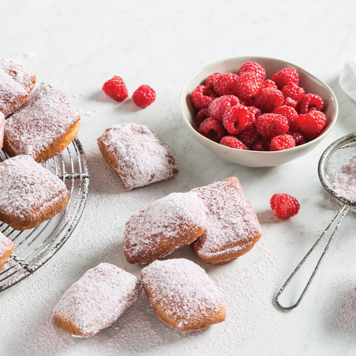 Enjoy a taste of the Big Easy with our Raspberry Beignets! These airy puffs dusted with powdered sugar are the perfect dessert to follow a hearty meal.